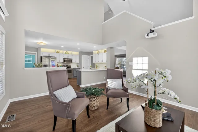 a view of a livingroom with furniture and wooden floor
