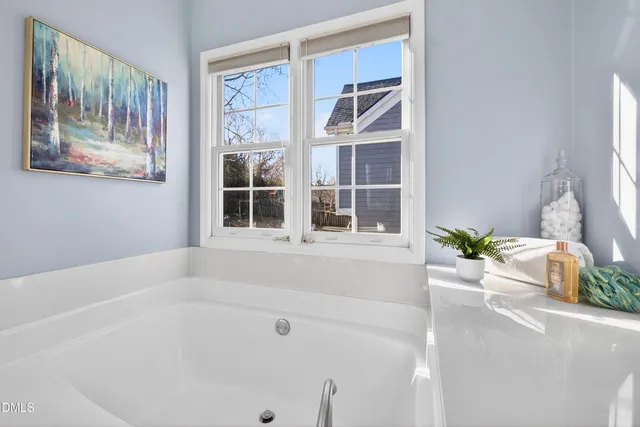 a front view of a house with a glass windows