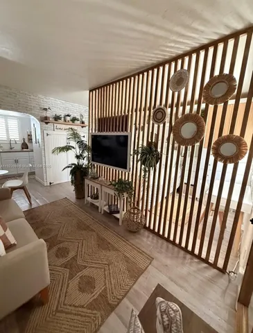 a view of a porch with furniture