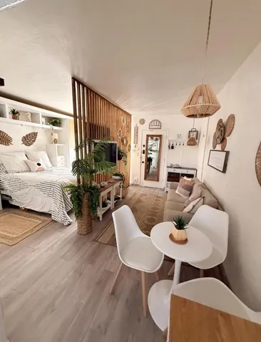 a living room with furniture and a table