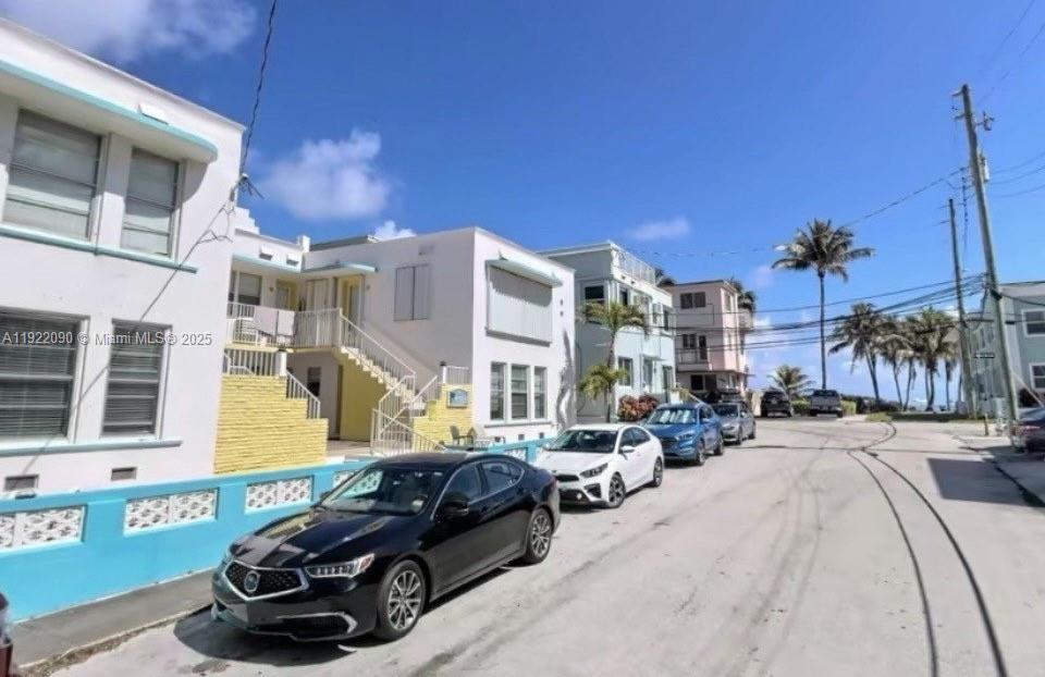 309 Crocus Terrace, Unit 9 Hollywood, FL 33019 - Photo 10 of 10 a view of a car park in front of a building