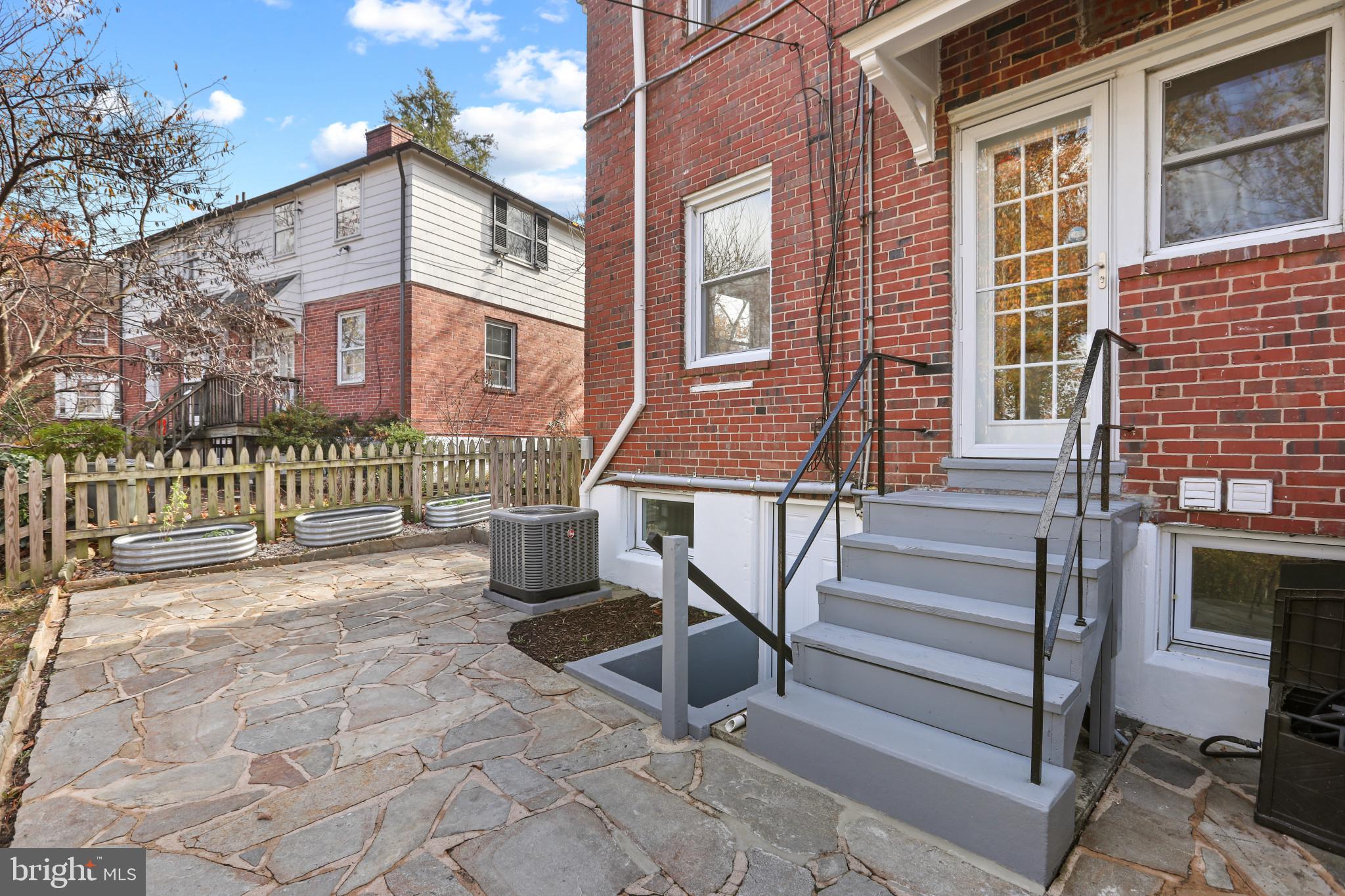 1324 Northview Road Baltimore, MD 21218 - Photo 29 of 36 Rear Patio with walk up stairs from lower level