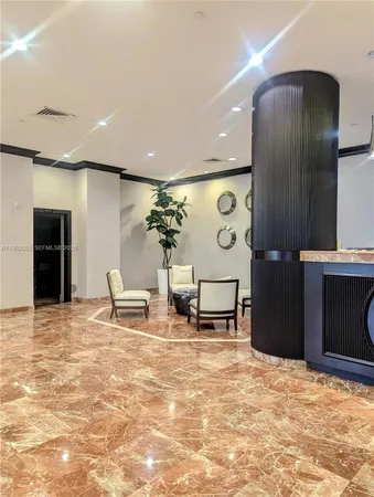 a lobby with furniture