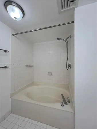 a close view of a bathtub in bathroom