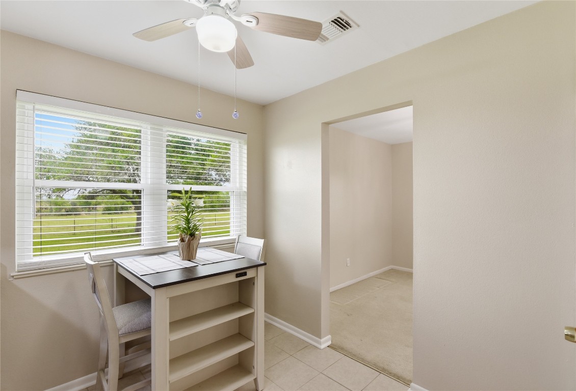1250 Stockwell Damon, TX 77430 - Photo 22 of 50 a view of a workspace with furniture and a window
