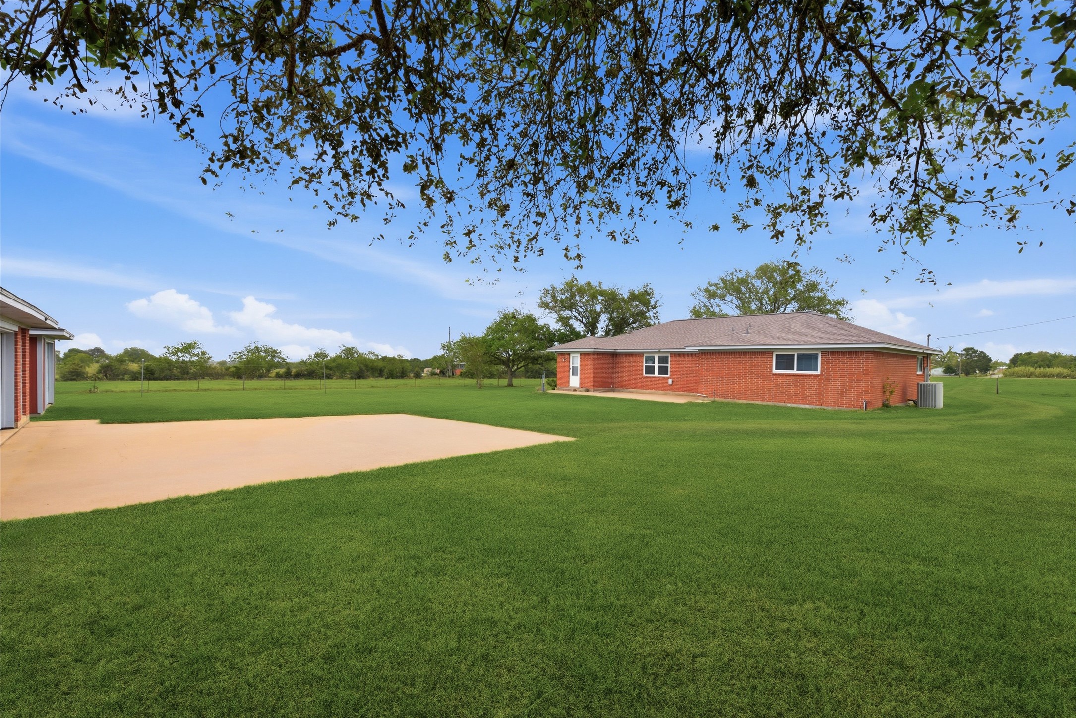 1250 Stockwell Damon, TX 77430 - Photo 4 of 50 a view of yard with swimming pool and green space