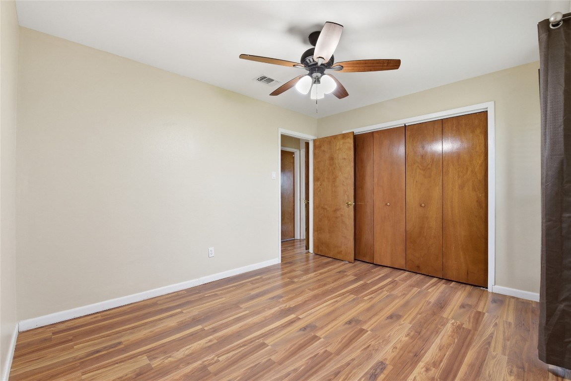 1250 Stockwell Damon, TX 77430 - Photo 42 of 50 a view of an empty room with wooden floor