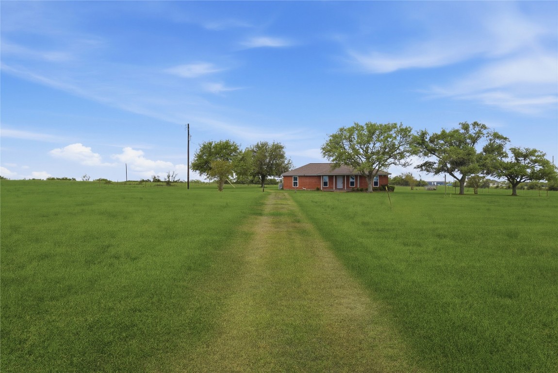1250 Stockwell Damon, TX 77430 - Photo 9 of 50 Drive through front pastures from gate and cattle guard.
