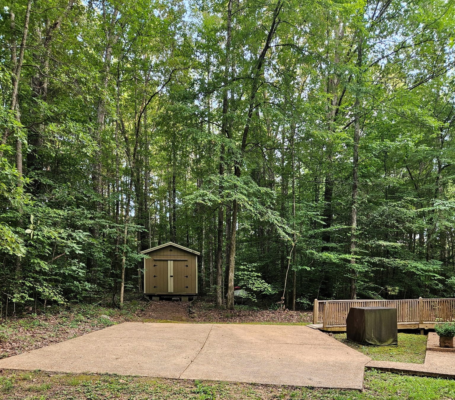 8202 State Highway 69 South Springville, TN 38256 - Photo 16 of 42 a backyard of a house with table and chairs