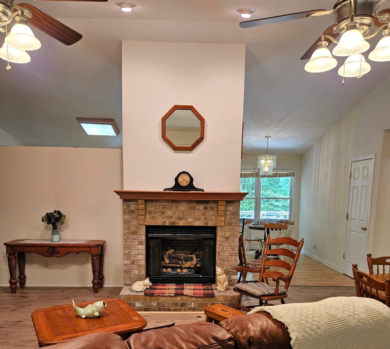 8202 State Highway 69 South Springville, TN 38256 - Photo 18 of 42 a living room with furniture a fireplace and a large window