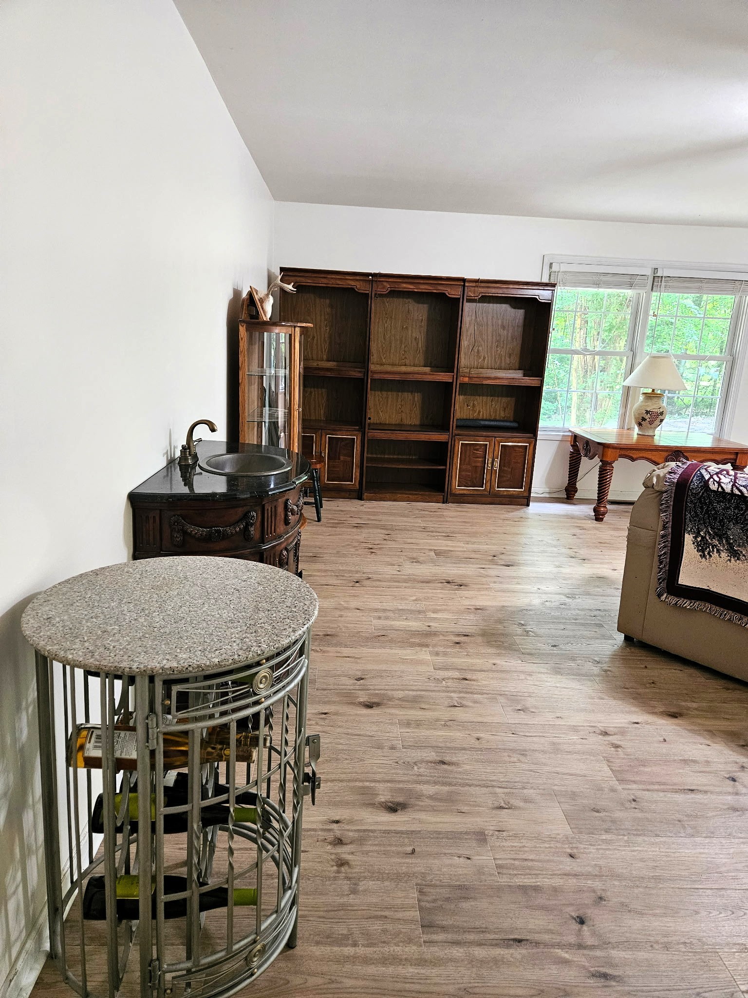 8202 State Highway 69 South Springville, TN 38256 - Photo 28 of 42 a living room with furniture a flat screen tv and a large window