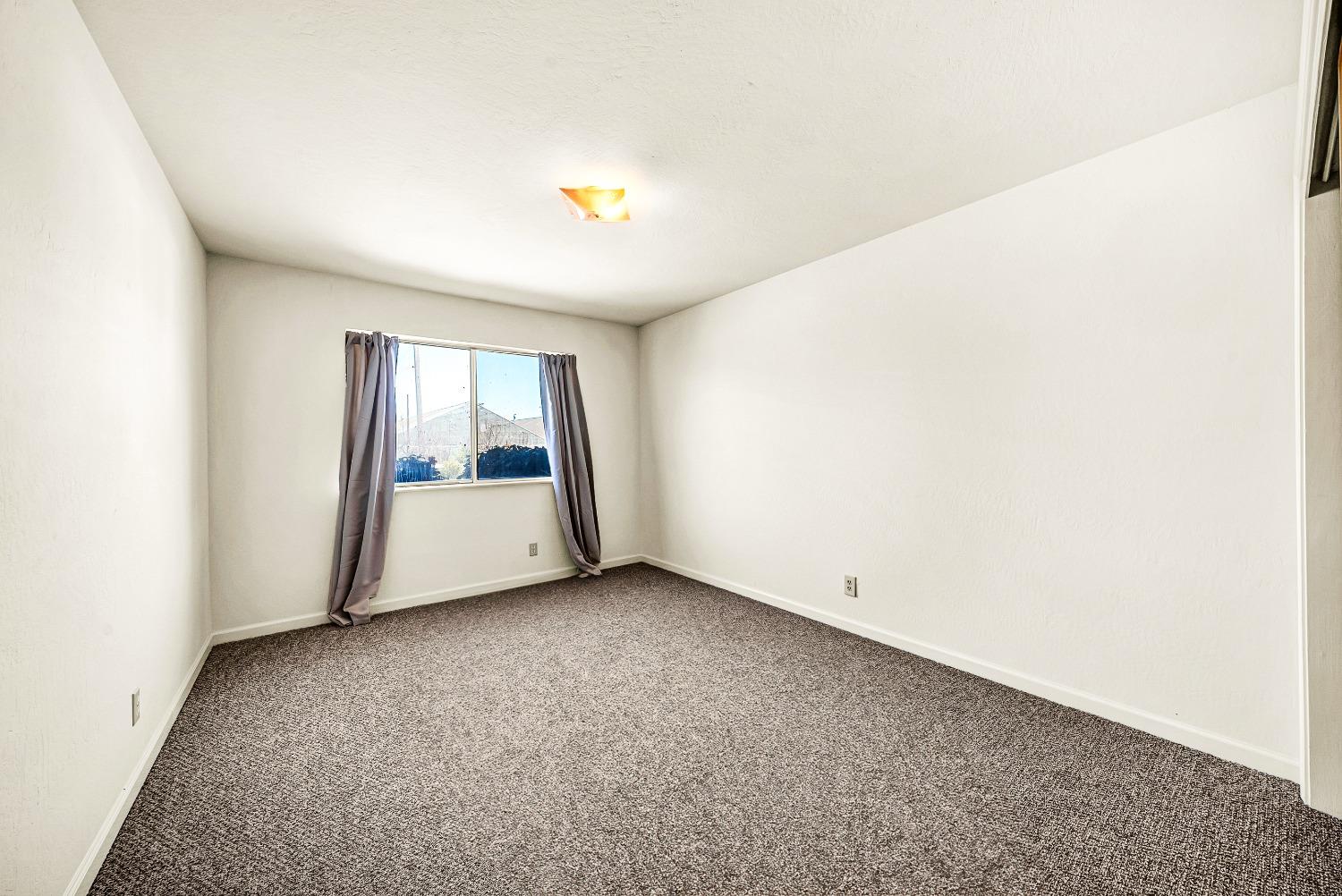 2 Lewis Watsonville, CA 95076 - Photo 14 of 92 a view of an empty room with a window