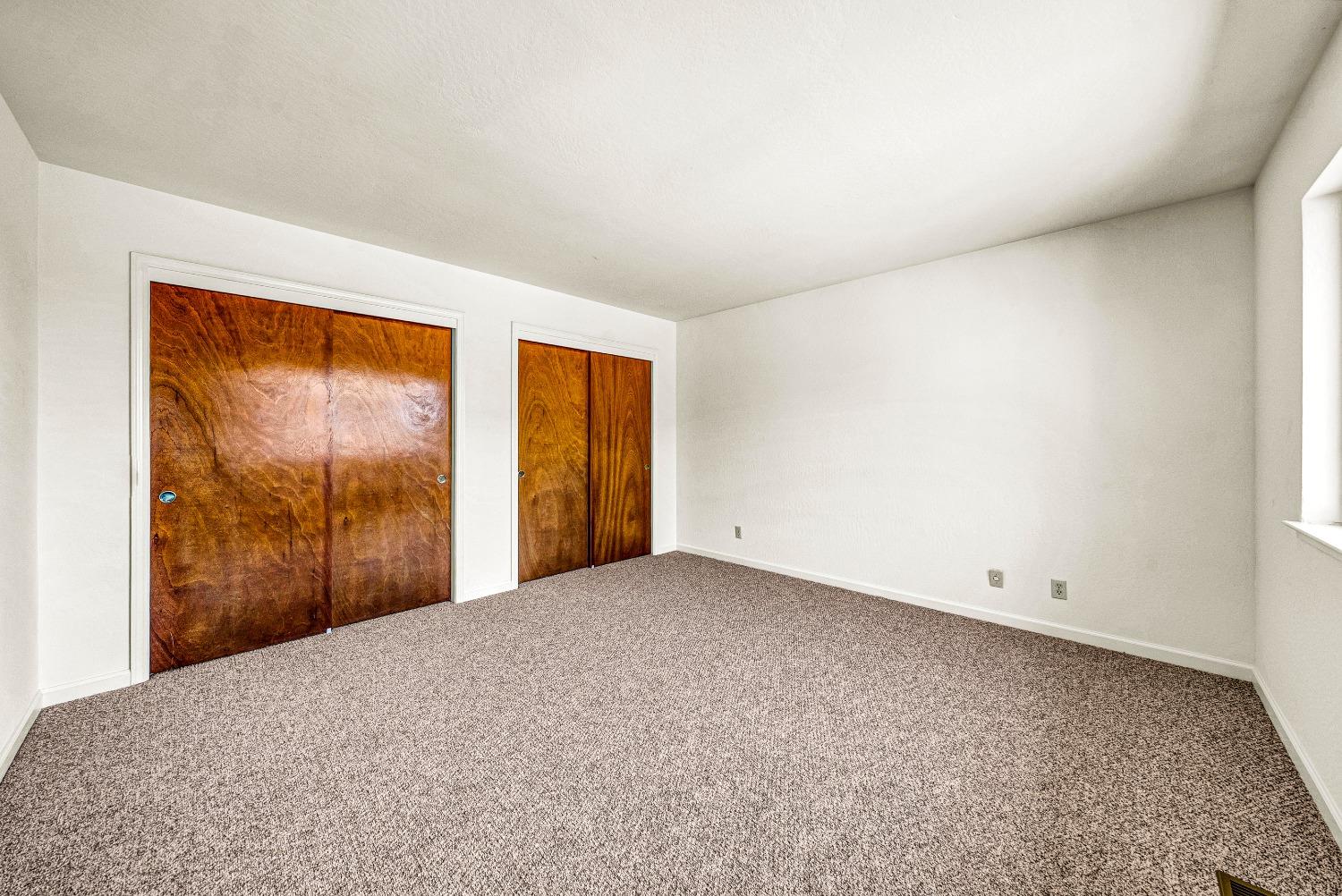 2 Lewis Watsonville, CA 95076 - Photo 18 of 92 a view of an empty room with a window