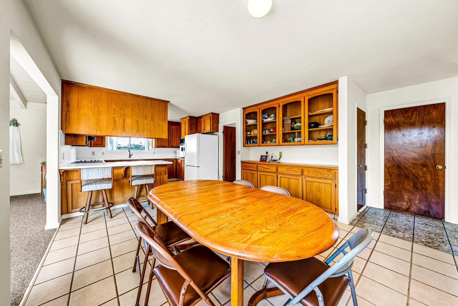 2 Lewis Watsonville, CA 95076 - Photo 22 of 92 a view of a dining room with furniture and a kitchen