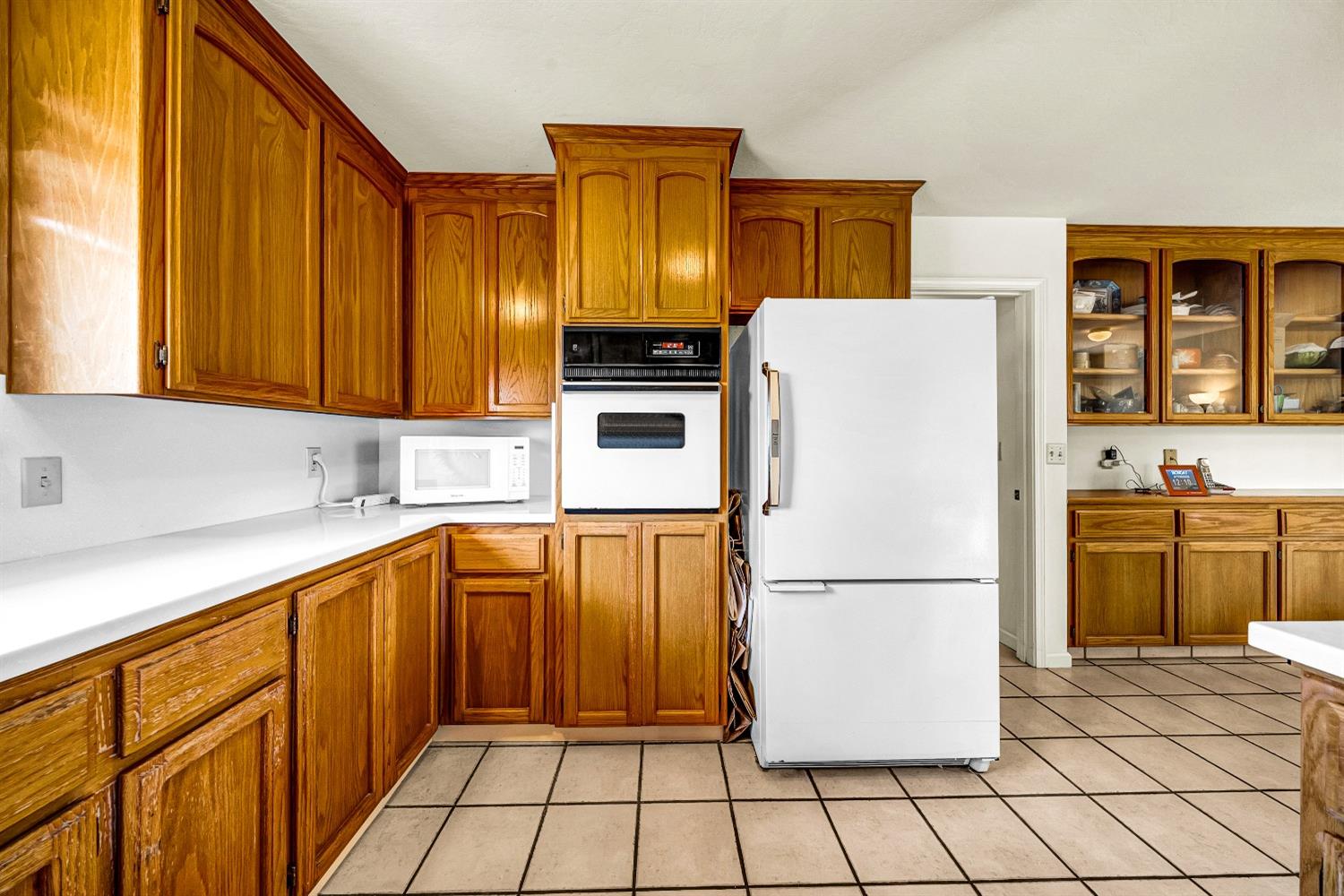 2 Lewis Watsonville, CA 95076 - Photo 25 of 92 a kitchen with stainless steel appliances granite countertop a refrigerator a stove top oven and a sink