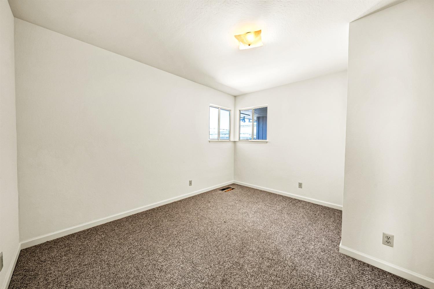 2 Lewis Watsonville, CA 95076 - Photo 51 of 92 a view of an empty room with a window