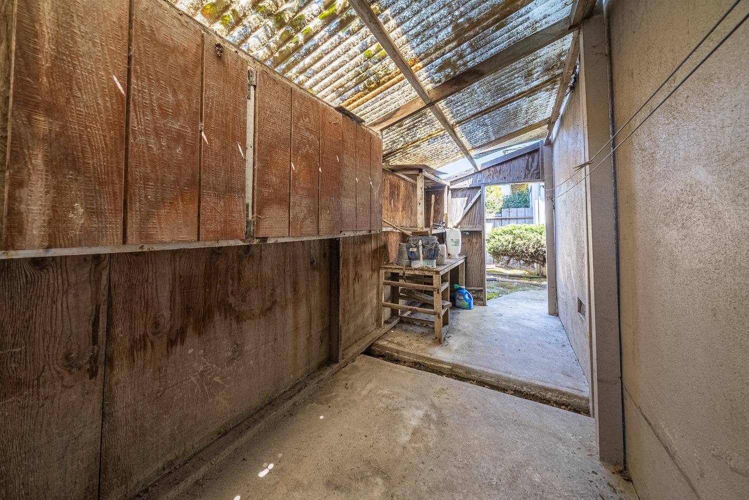 2 Lewis Watsonville, CA 95076 - Photo 64 of 92 a view of a room with wooden walls and iron stairs