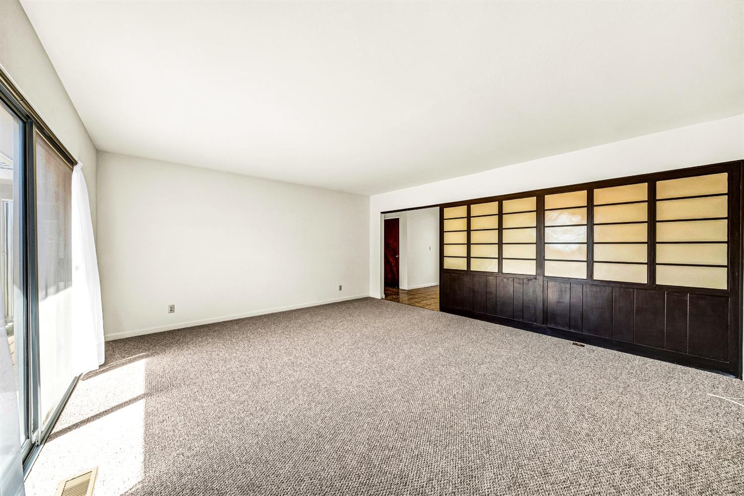 2 Lewis Watsonville, CA 95076 - Photo 10 of 92 a view of an empty room with a window