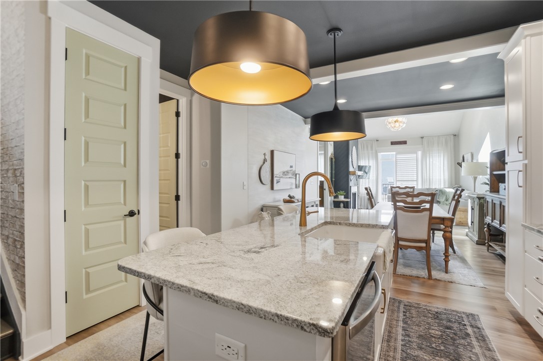 605 Cape Cod Court Beavercreek, OH 45430 - Photo 14 of 54 This kitchen showcases a central island, creating a functional and inviting space.