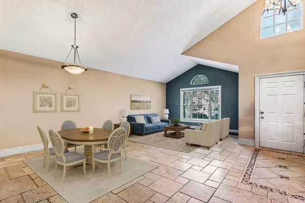 a living room with furniture and window
