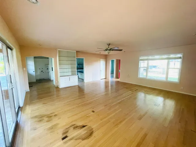 a view of an empty room and window