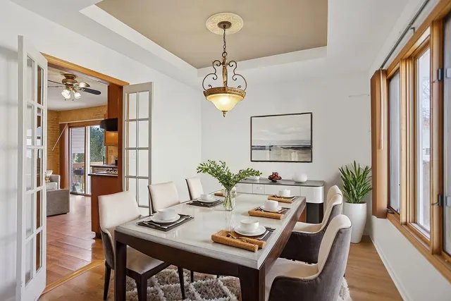 a view of a dining room with furniture window and outside view