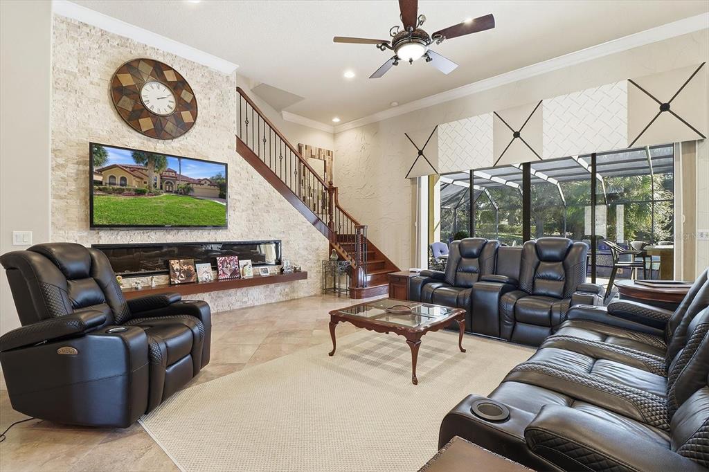 1416 North Ridge Meadow Path Hernando, FL 34442 - Photo 13 of 68 a living room with furniture and a flat screen tv