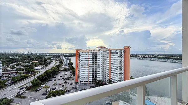 a view of a city skyline from a balcony