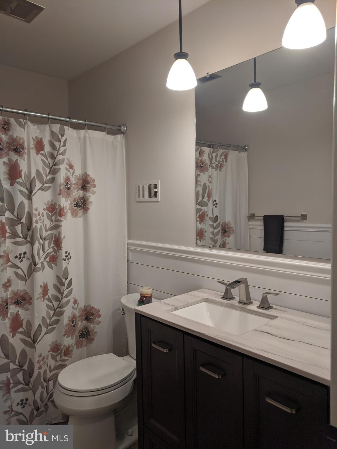 3 Club Lane Reading, PA 19607 - Photo 22 of 34 Updated Hall Bath w/ Wainscotting & New Vanity