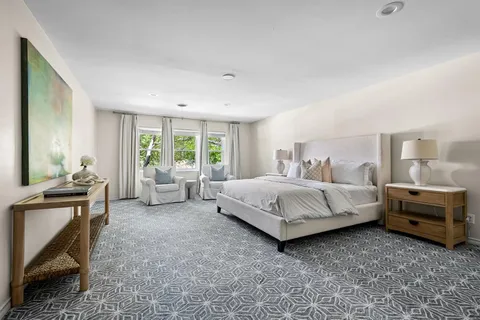 a bedroom with a bed and closet