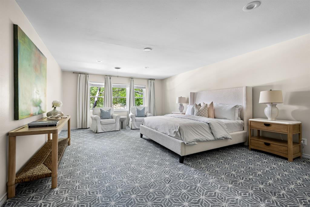 6226 Bandera Avenue, Unit C Dallas, TX 75225 - Photo 11 of 19 a bedroom with a bed and a window