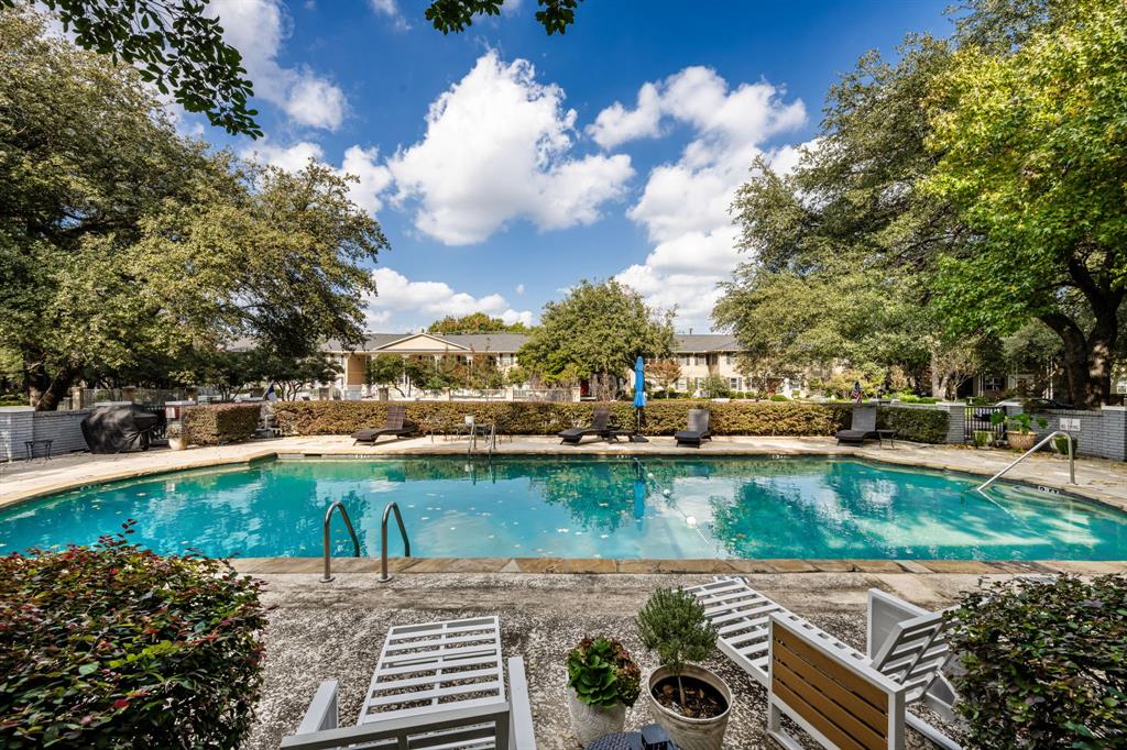 6226 Bandera Avenue, Unit C Dallas, TX 75225 - Photo 19 of 19 a view of a swimming pool with a patio