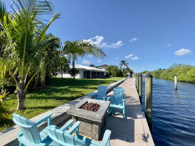 a view of a wooden deck and a garden