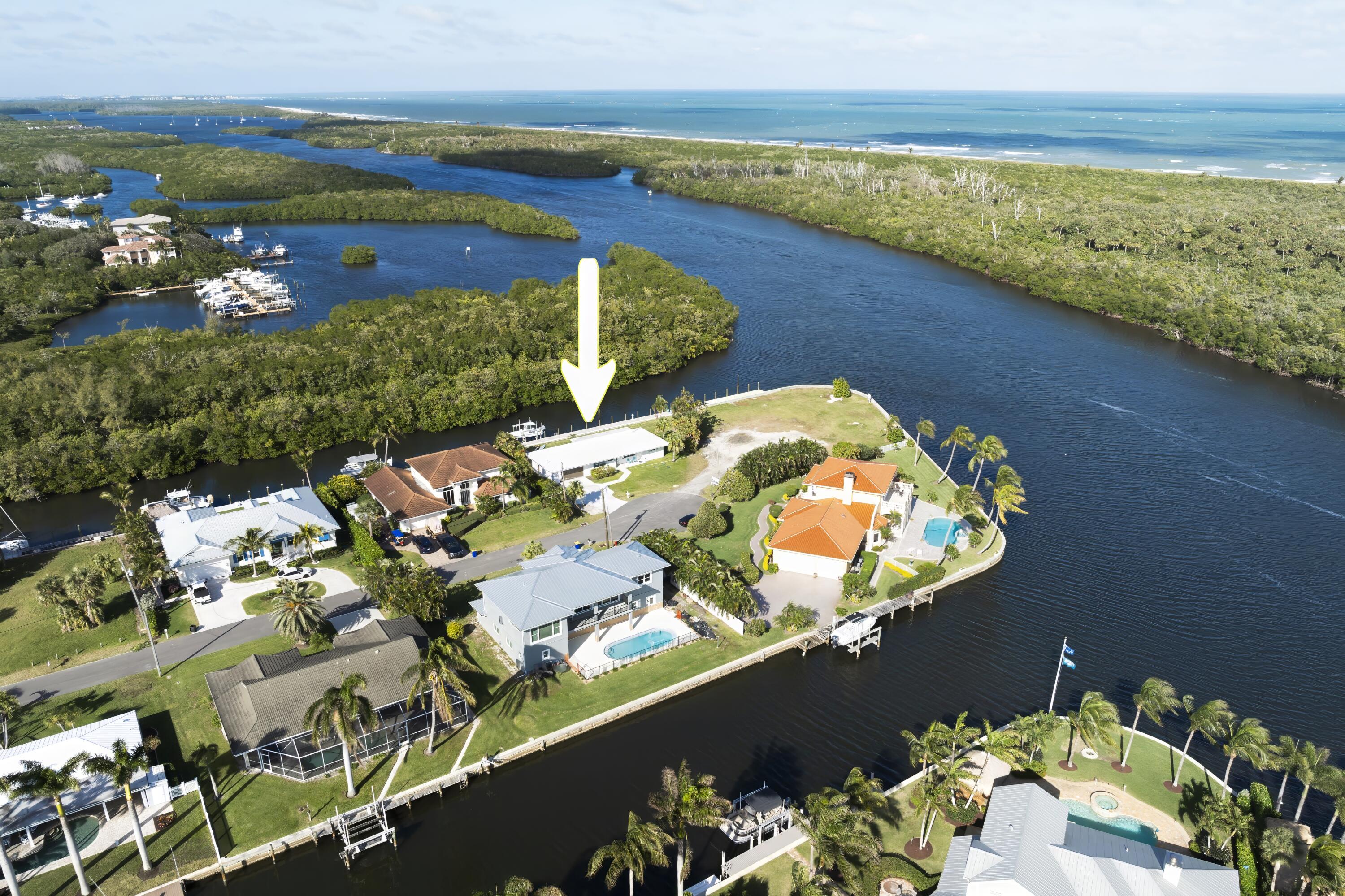 8585 Southeast Palm Street Hobe Sound, FL 33455 - Photo 38 of 43 view of a lake with a mountain view