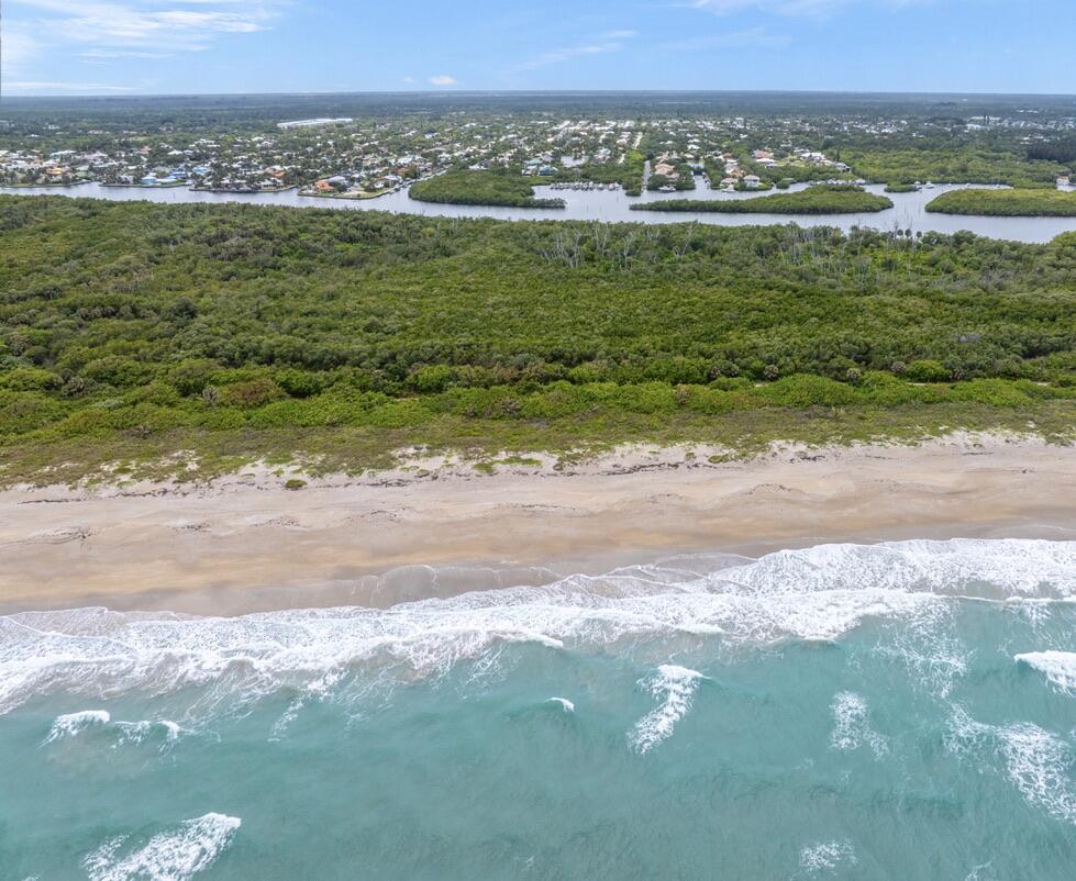 8585 Southeast Palm Street Hobe Sound, FL 33455 - Photo 39 of 43 a view of a city with an ocean