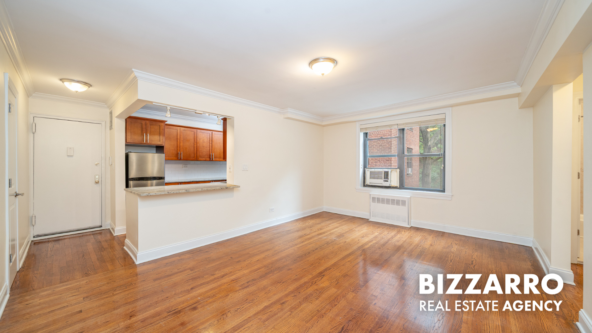 Undisclosed Address Manhattan, NY 10040 - Photo 2 of 10 a view of an empty room and window