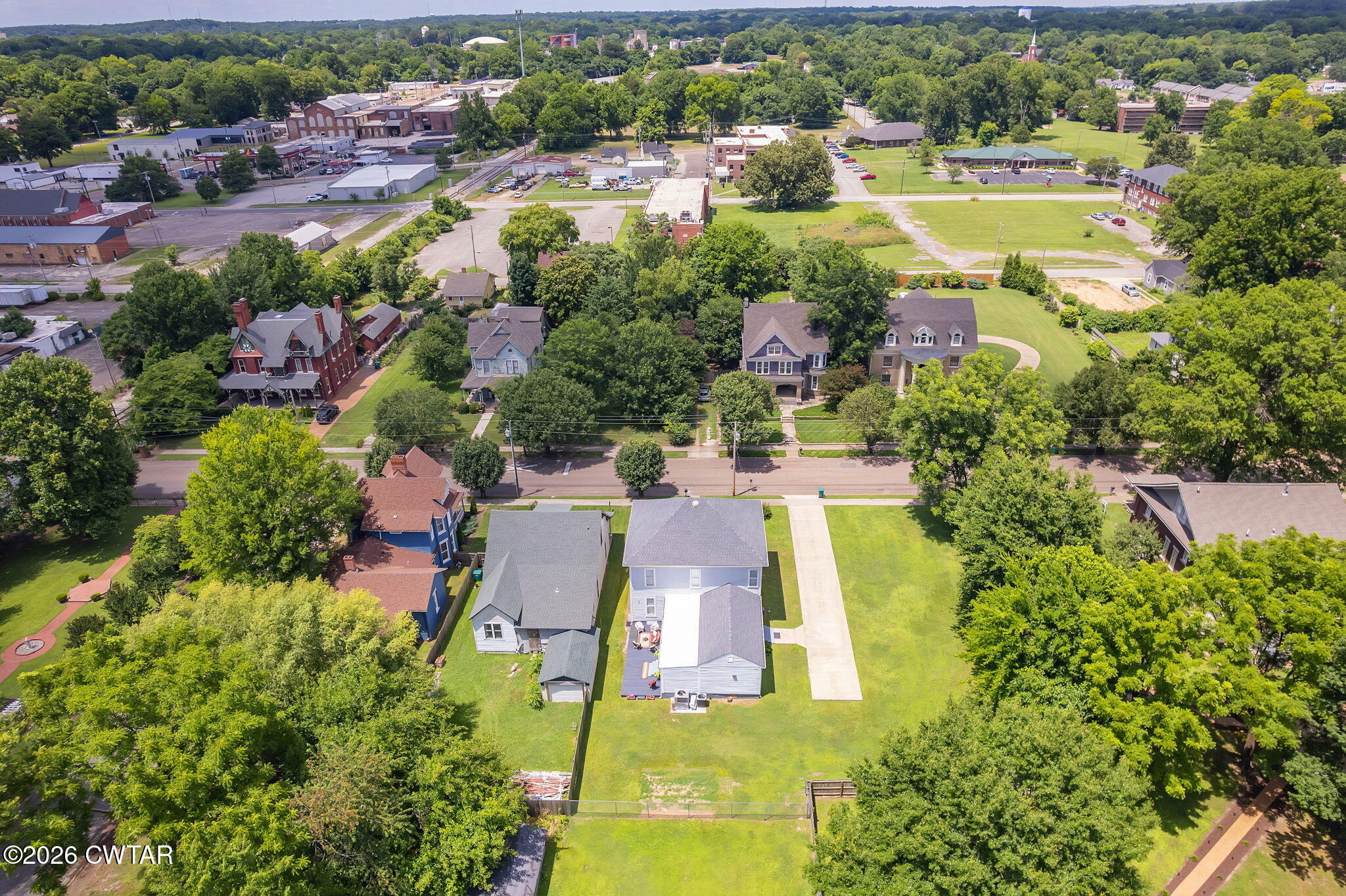 554 East Main Street Jackson, TN 38301 - Photo 54 of 60 an aerial view of residential houses with outdoor space and swimming pool