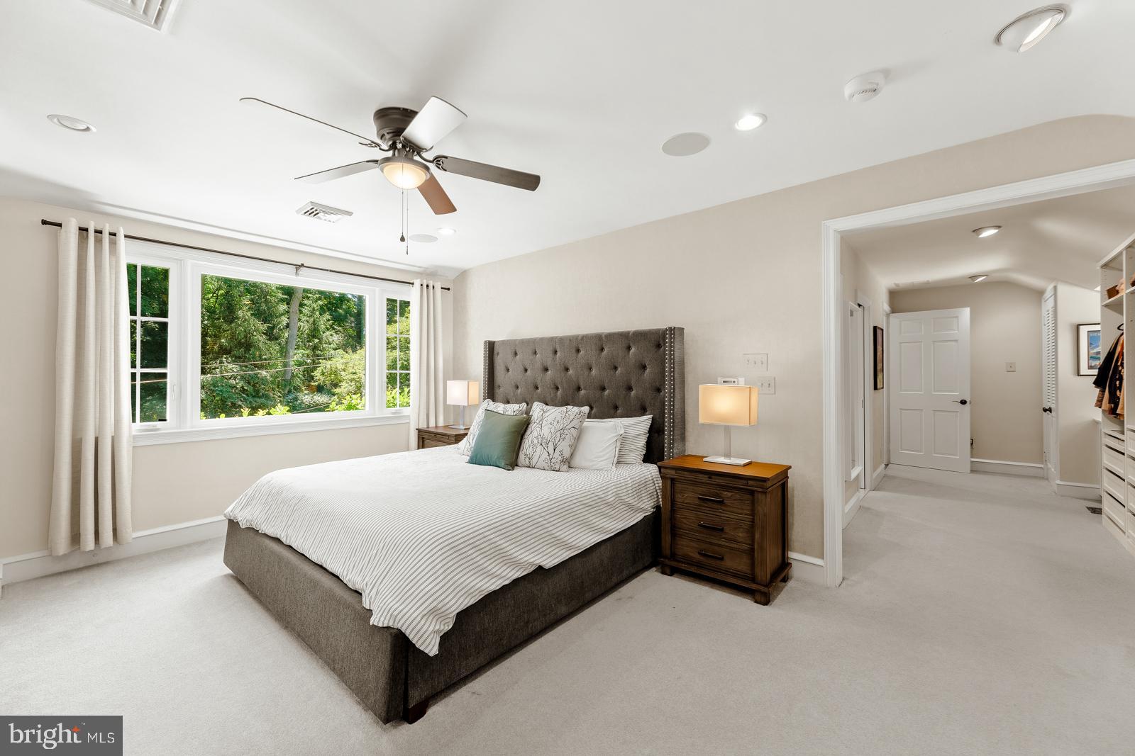 1700 Old Welsh Road Huntingdon Valley, PA 19006 - Photo 34 of 105 a large bedroom with a large bed and large window