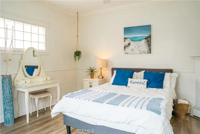 a bedroom with a bed and a fireplace