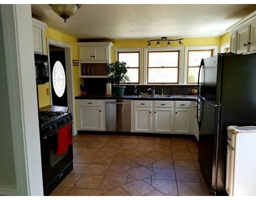 2322 Greenwich Road Hardwick, MA 01082 - Photo 3 of 19 a kitchen with stainless steel appliances a sink a stove a refrigerator a sink a counter top space and cabinets