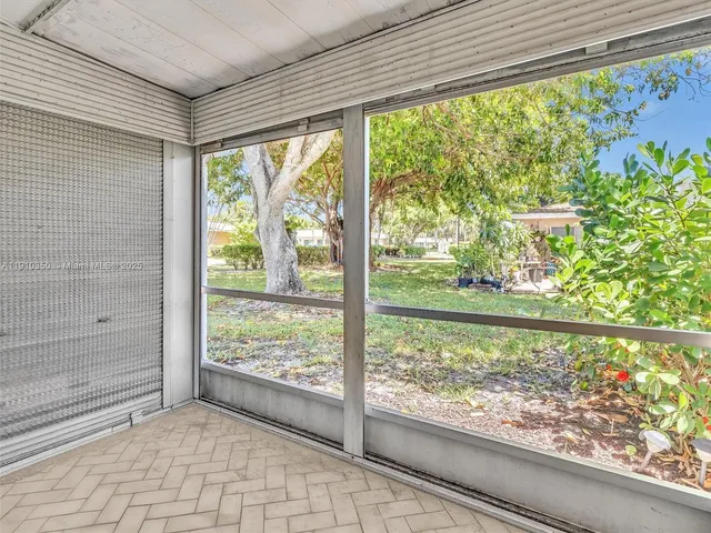 a park view with a seating space