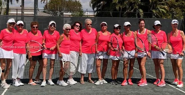 an aerial view of residential houses with outdoor space and swimming pool