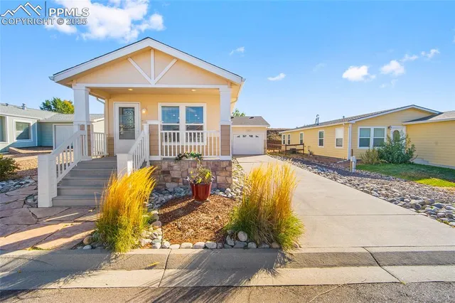 a view of a house with swimming pool