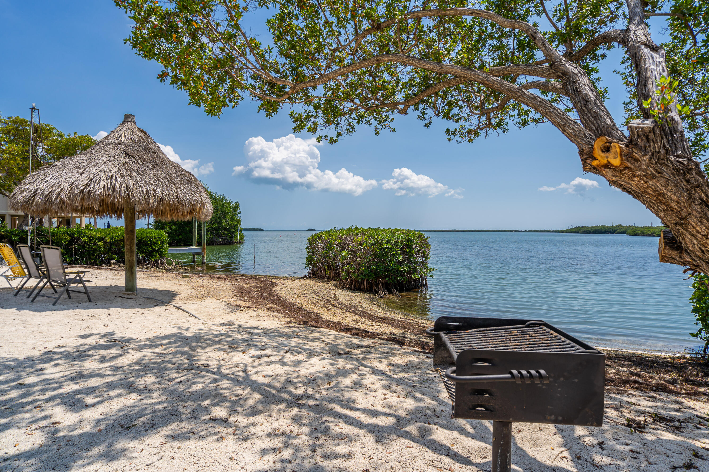 100 Morris Lane, Unit E8 Key Largo, FL 33037 - Photo 18 of 22 a view of a house with a yard