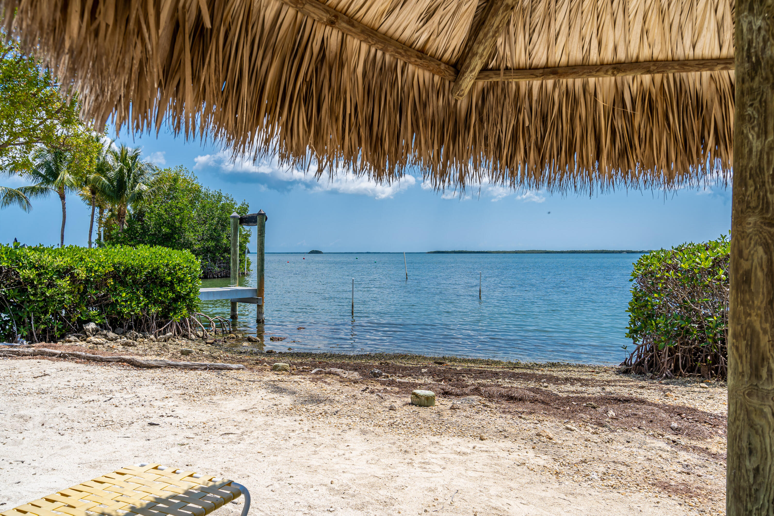 100 Morris Lane, Unit E8 Key Largo, FL 33037 - Photo 20 of 22 a view of a backyard of a house