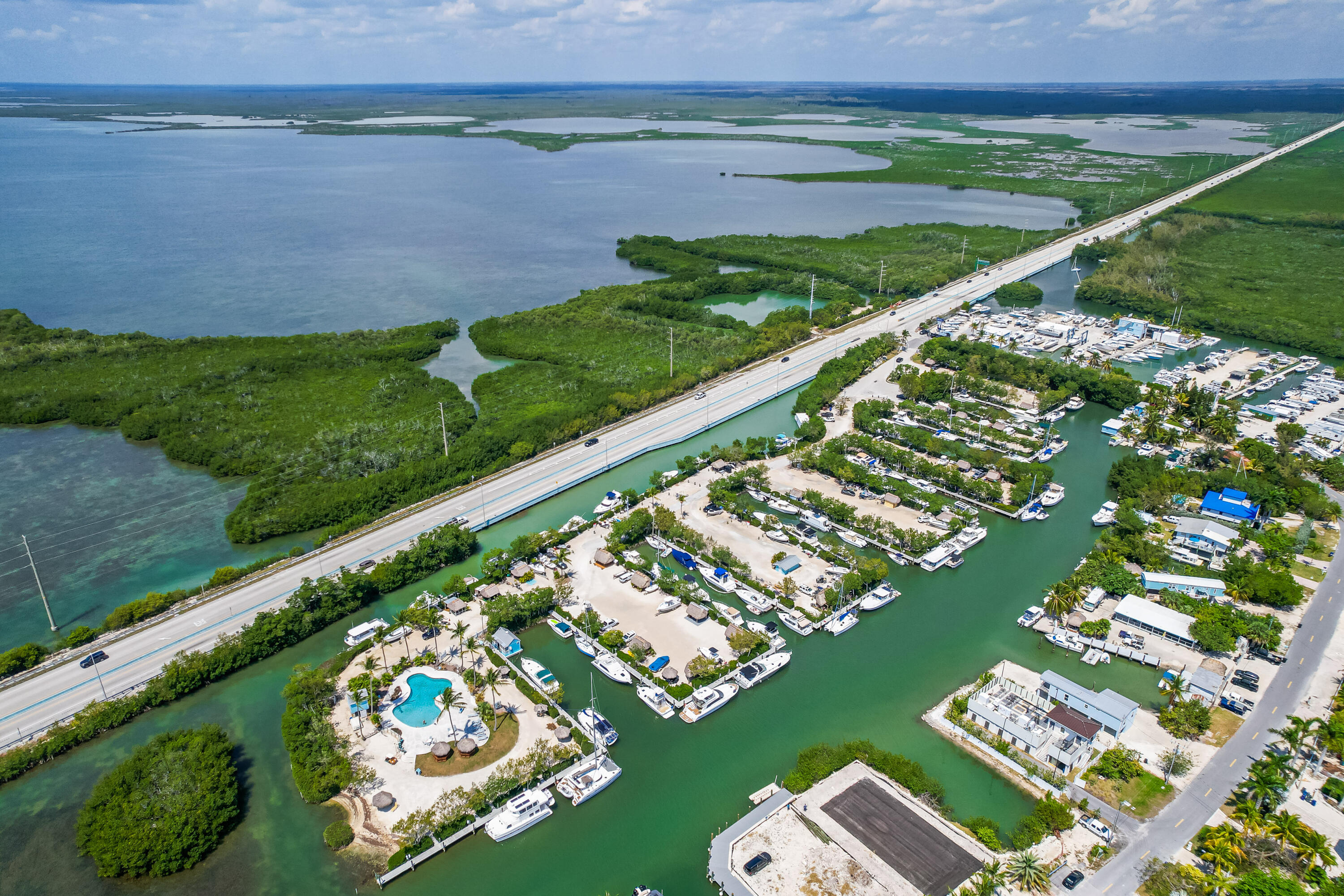 100 Morris Lane, Unit E8 Key Largo, FL 33037 - Photo 6 of 22 a view of a lake with a big yard