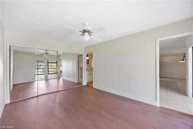 an empty room with a bathroom and a bathroom