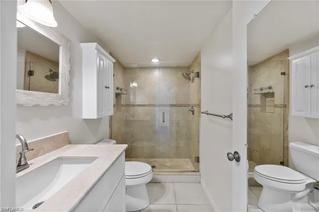 a view of a pool table and chairs