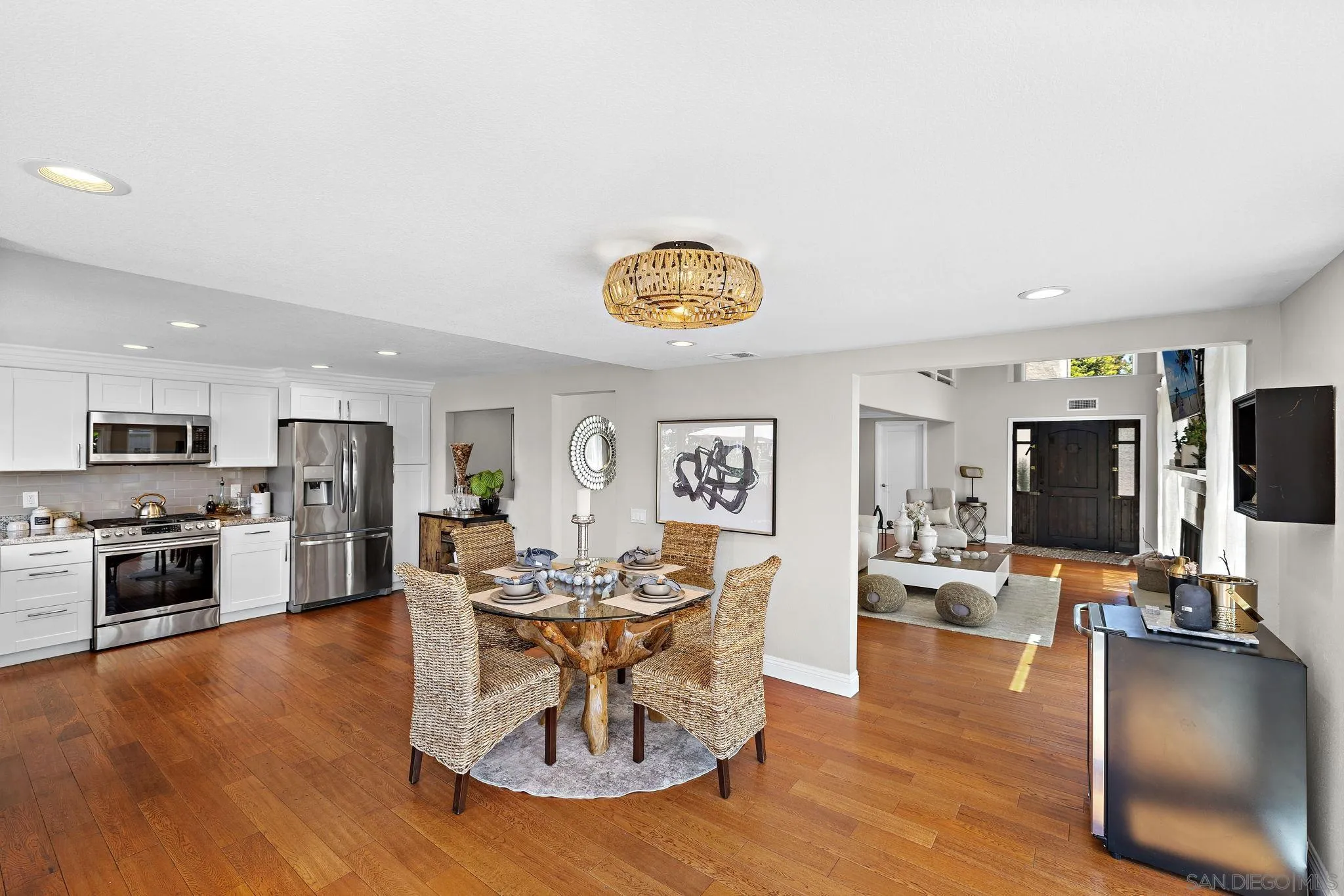 22875 Ridge Rte Lane Lake Forest, CA 92630 - Photo 11 of 54 a living room with furniture a dining table and kitchen view