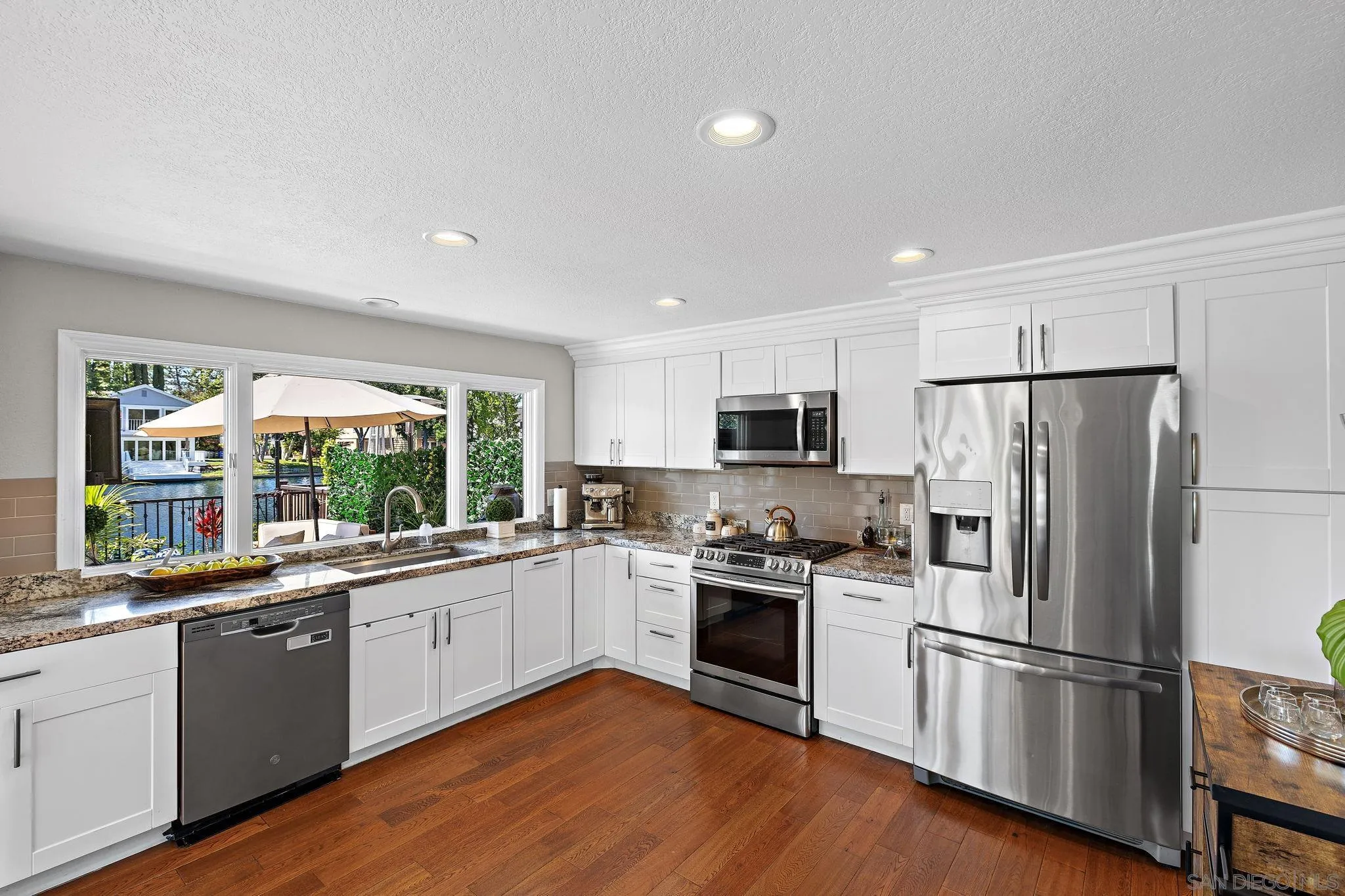 22875 Ridge Rte Lane Lake Forest, CA 92630 - Photo 13 of 54 a kitchen with a sink stainless steel appliances a sink and a window